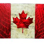 Image of Plasma Cut Steel Canadian Flag in Red Candy Coating on an Aged Wood Backing. 